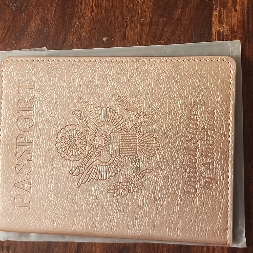 New Passport Cover In Shimmer Pink.